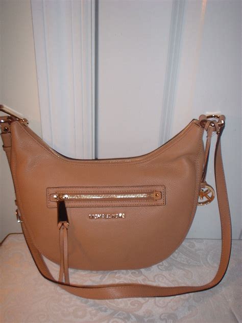 michael michael kors rhea small zip messenger bag suntan|michael michael kors rhea zip small backpack.